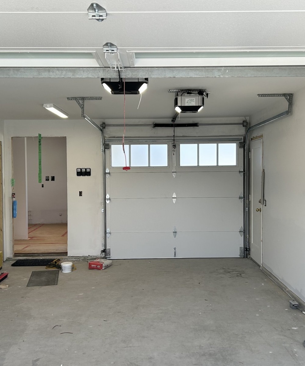 Clopay Coachman Series CG11 garage door with REC 13 windows installed in Ladner BC