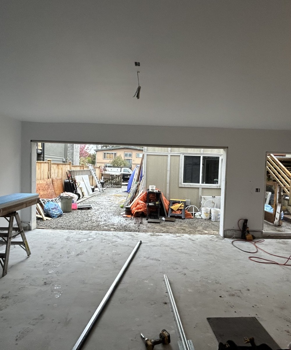 New garage door installation in Ladner with Hormann white flush panel door