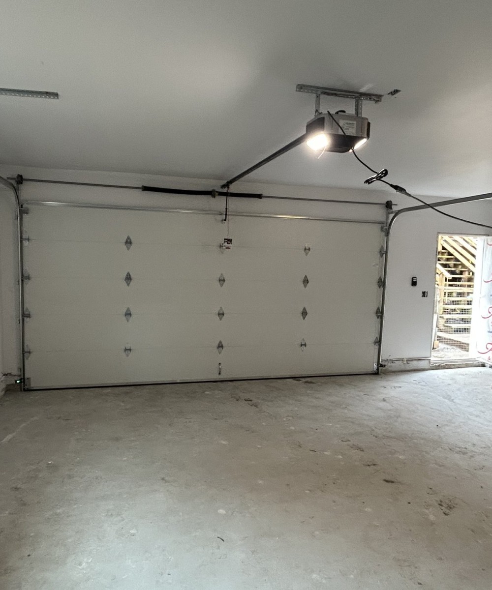 New garage door installation in Ladner with Hormann white flush panel door