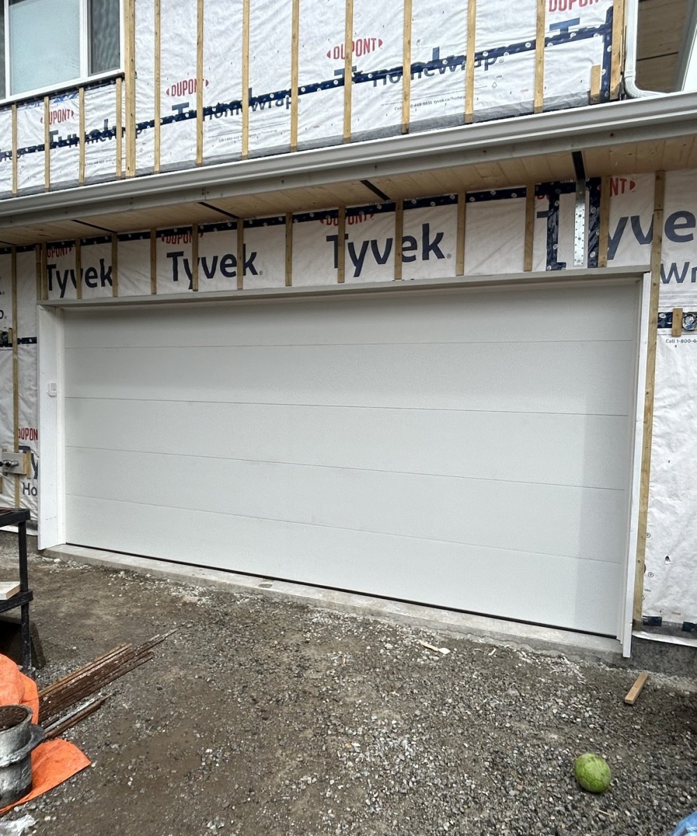 New garage door installation in Ladner with Hormann white flush panel door