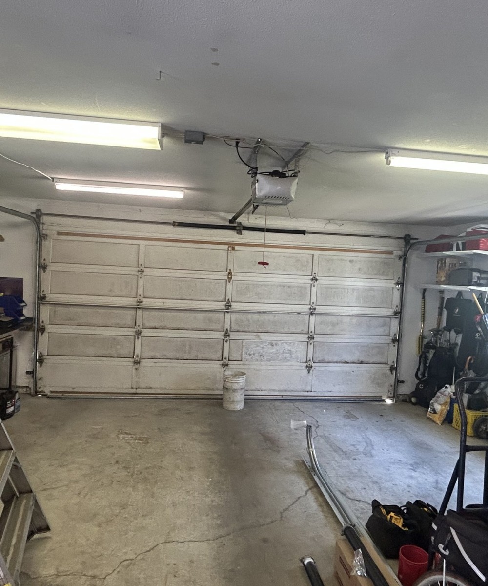 White Hormann 3400 Long Panel garage door installed in Ladner