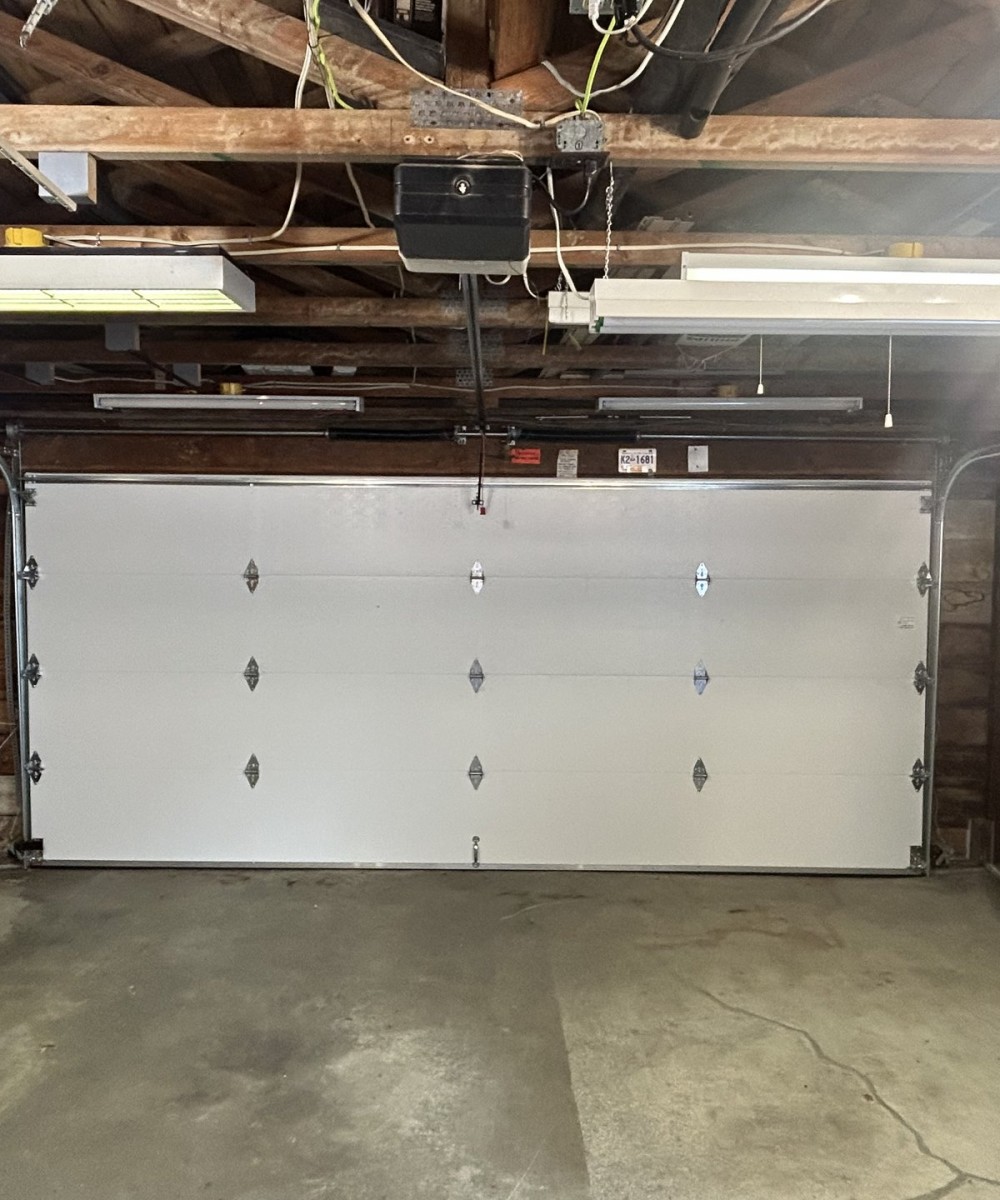 Hormann garage door installation in Vancouver - white Long Panel door