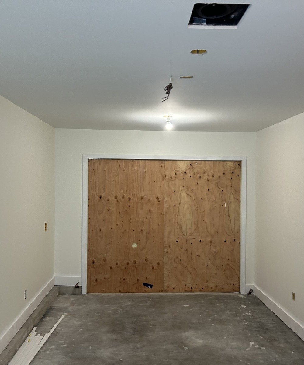 Amarr Olympus OL3200 black garage door with glass top sections in Vancouver